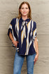 Perfee Tie Neck Printed Slit Sleeve Blouse